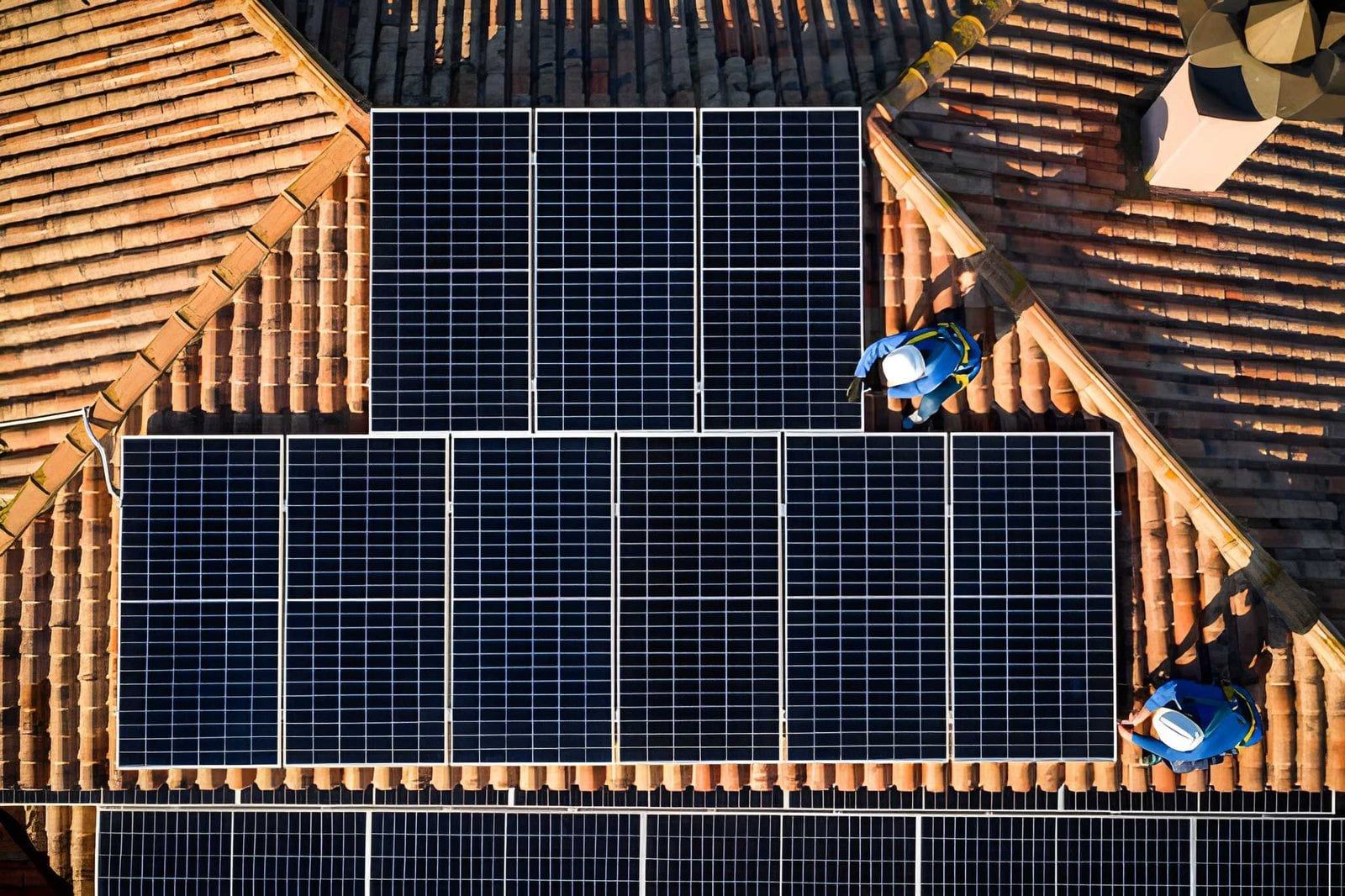Solar panels being installed on an Arizona tile roof