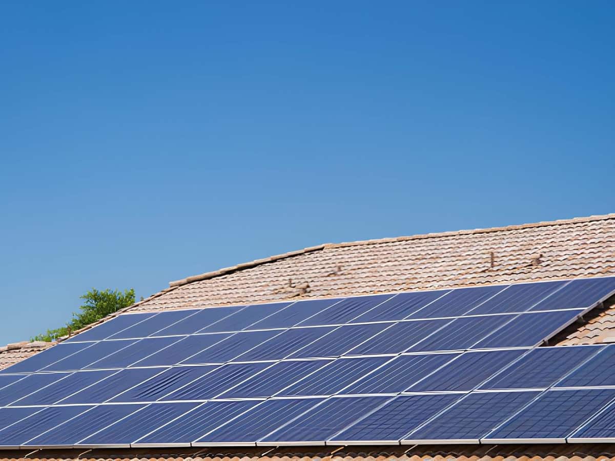 Close detail of a clean solar panel row with flush mounting